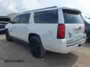 2015 Chevrolet Suburban LT z VIN 1GNSCJKCXFR700715, wystawiony jako IAAI lot #42748716 z przebiegiem 169 082 mil mil oraz . Historia ofert i sprzedaży dostępna na DreamBid. Obrazek 3.