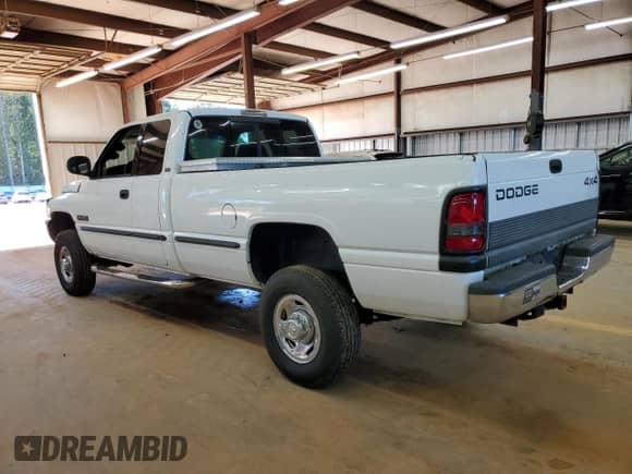 1999 Dodge 2500 с VIN 3B7KF2367XG176603, выставлен на аукционе Copart как лот 86500025 с пробегом 210 965 миль миль и Списание • Salvage title. История ставок и продаж доступна на DreamBid. Изображение 2.