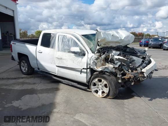 2016 Chevrolet Silverado 1500 LT z VIN 3GCUKREC5GG191603, wystawiony jako IAAI lot #34016468 z przebiegiem Nie podano mil oraz . Historia ofert i sprzedaży dostępna na DreamBid. Obrazek 1.