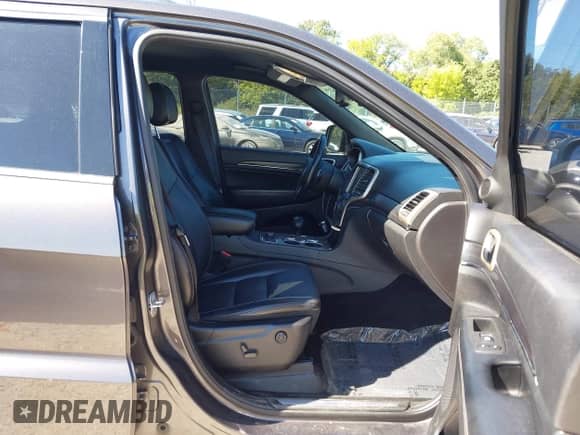 2014 Jeep Grand Cherokee Limited z VIN 1C4RJFBT0EC135211, wystawiony jako IAAI lot #43054104 z przebiegiem 147 243 mil mil oraz . Historia ofert i sprzedaży dostępna na DreamBid. Obrazek 5.