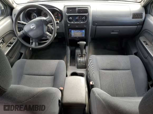 2004 Nissan Frontier XE with VIN 1N6ED29X54C477952, listed as a Copart auction lot 81516345 with 255,069 mi miles and Salvage title. Bid and sale history available at DreamBid. Image 8.