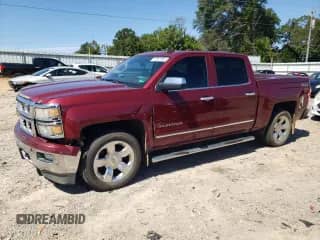 2015 Chevrolet Silverado 1500 LTZ with VIN 3GCUKSEC8FG119140, listed as a Copart auction lot 71081995 with 238,811 mi miles and Salvage title. Bid and sale history available at DreamBid. Image 1.