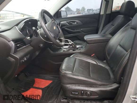 2021 Chevrolet Traverse Premier с VIN 1GNEVKKW9MJ239431, выставлен на аукционе Copart как лот 58696395 с пробегом 52 099 миль миль и Списание • Salvage title. История ставок и продаж доступна на DreamBid. Изображение 7.