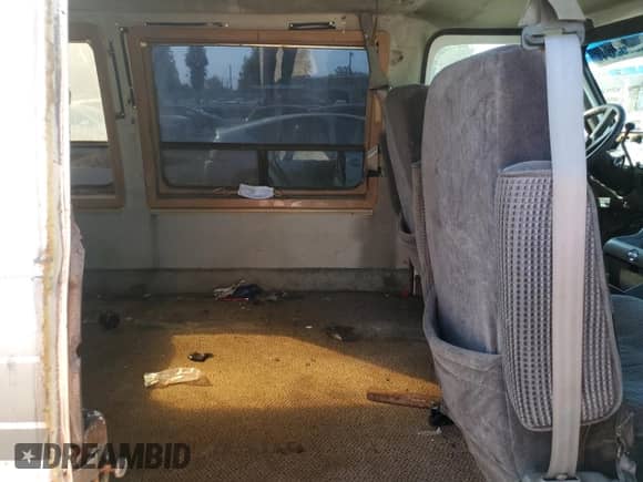 1990 Chevrolet Chevy Van with VIN 1GBEG25K0L7167885, listed as a Copart auction lot 72575264 with 231,827 mi miles and Salvage title. Bid and sale history available at DreamBid. Image 11.