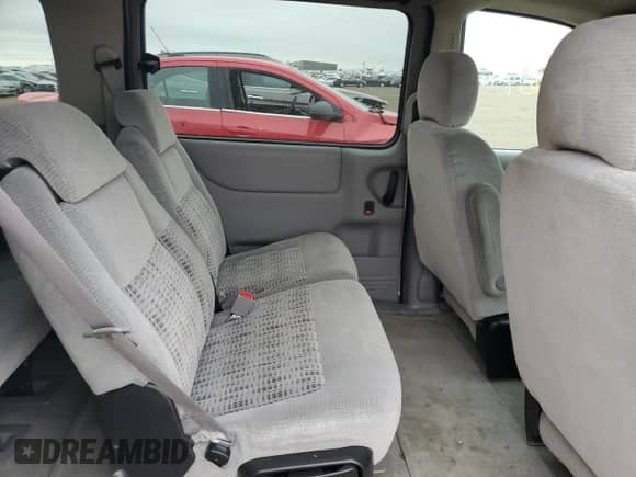 2003 Chevrolet Venture Y3G Mobility с VIN 1GNDX03E73D201497, выставлен на аукционе Copart как лот 51595855 с пробегом 143 067 миль миль и На запчасти • Non repairable. История ставок и продаж доступна на DreamBid. Изображение 6.