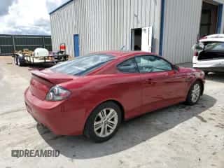 2007 Hyundai Tiburon GS с VIN KMHHM66D57U249543, выставлен на аукционе Copart как лот 54241834 с пробегом 190 951 миль миль и Списание • Salvage title. История ставок и продаж доступна на DreamBid. Изображение 3.