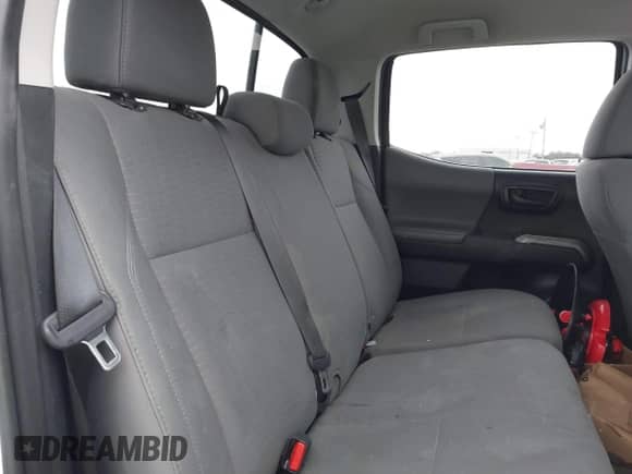 2018 Toyota Tacoma SR5 z VIN 3TMBZ5DN4JM014788, wystawiony jako IAAI lot #41252667 z przebiegiem 113 530 mil mil oraz . Historia ofert i sprzedaży dostępna na DreamBid. Obrazek 8.