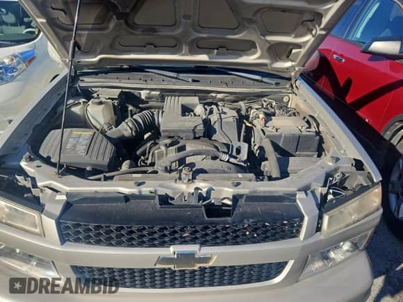 2009 Chevrolet Colorado Work Truck with VIN 1GCCS19E198127785, listed as a Copart auction lot 85679794 with 167,149 mi miles and Clean title. Bid and sale history available at DreamBid. Image 7.