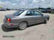 2003 Hyundai XG with VIN KMHFU45E83A238957, listed as a Copart auction lot 62728335 with 103,290 mi miles and Salvage title. Bid and sale history available at DreamBid. Image 3.