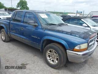 2002 Dodge Dakota SLT with VIN 1B7HL48X22S533364, listed as a IAAI auction lot 42414807 with 154,993 mi miles and . Bid and sale history available at DreamBid. Image 1.