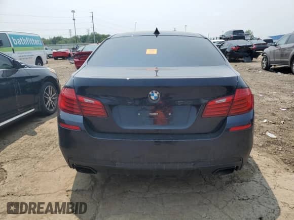 2015 BMW 5 Series 550i xDrive with VIN WBAKP9C52FD979793, listed as a Copart auction lot 59048495 with Not provided miles and Salvage title. Bid and sale history available at DreamBid. Image 6.