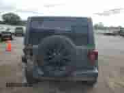 2022 Jeep Wrangler Unlimited Sahara with VIN 1C4HJXEM8NW217773, listed as a Copart auction lot 85325825 with 66,628 mi miles and Salvage title. Bid and sale history available at DreamBid. Image 6.