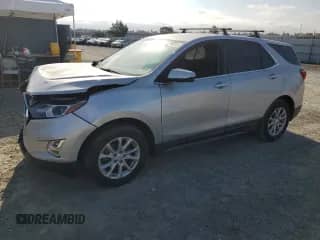 2018 Chevrolet Equinox LT with VIN 2GNAXSEV0J6240696, listed as a Copart auction lot 80216515 with 83,553 mi miles and Salvage title. Bid and sale history available at DreamBid. Image 1.
