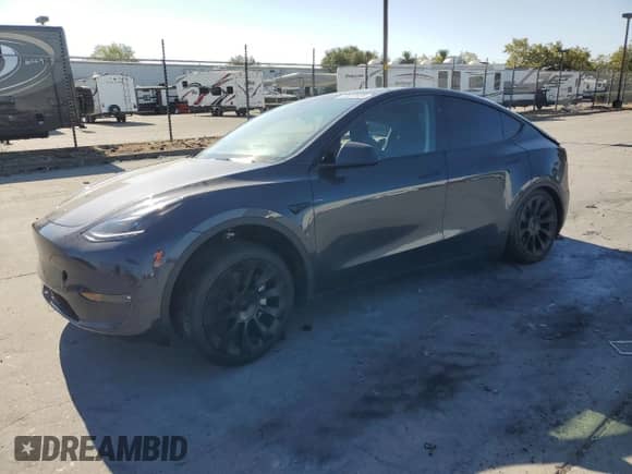 2024 Tesla Model Y Long Range with VIN 7SAYGDEE1RF073891, listed as a Copart auction lot 65612434 with 4,448 mi miles and Salvage title. Bid and sale history available at DreamBid. Image 1.
