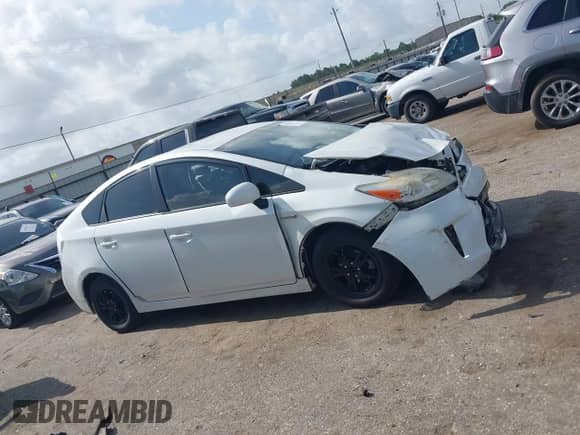 2015 Toyota Prius Four z VIN JTDKN3DU7F1917285, wystawiony jako IAAI lot #42536395 z przebiegiem 265 498 mil mil oraz . Historia ofert i sprzedaży dostępna na DreamBid. Obrazek 13.