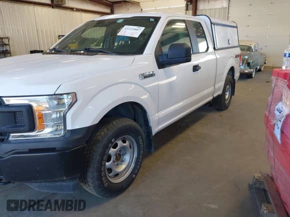 2019 Ford F-150 XL with VIN 1FTEX1EB3KKC53693, listed as a IAAI auction lot 43325007 with 206,622 mi miles and . Bid and sale history available at DreamBid. Image 2.