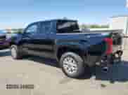 2024 Toyota Tacoma SR5 with VIN 3TMLB5JNXRM054298, listed as a Copart auction lot 66528135 with 5,976 mi miles and Salvage title. Bid and sale history available at DreamBid. Image 2.