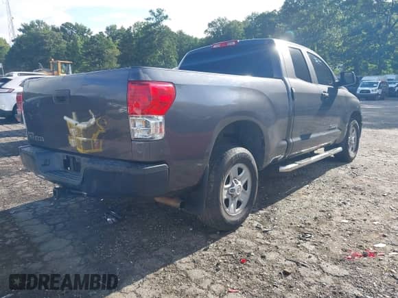 2012 Toyota Tundra z VIN 5TFRU5F14CX026640, wystawiony jako IAAI lot #42994627 z przebiegiem 310 619 mil mil oraz . Historia ofert i sprzedaży dostępna na DreamBid. Obrazek 4.