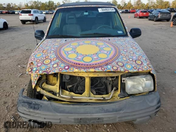 2003 Chevrolet Tracker with VIN 2CNBE18C136928311, listed as a Copart auction lot 84463154 with 118,195 mi miles and Salvage title. Bid and sale history available at DreamBid. Image 5.