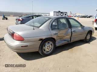 1999 Chevrolet Lumina z VIN 2G1WL52M5X9126135, wystawiony jako Copart lot #70958174 z przebiegiem 171 336 mil mil oraz Szkoda całkowita • Salvage title. Historia ofert i sprzedaży dostępna na DreamBid. Obrazek 3.