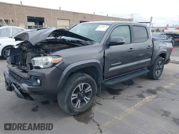 2017 Toyota Tacoma SR5 with VIN 5TFCZ5ANXHX081201, listed as a IAAI auction lot 43354371 with 83,668 mi miles and . Bid and sale history available at DreamBid. Image 2.