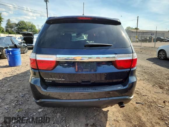 2013 Dodge Durango Crew with VIN 1C4RDJDGXDC674251, listed as a Copart auction lot 70298395 with 189,305 mi miles and Salvage title. Bid and sale history available at DreamBid. Image 6.