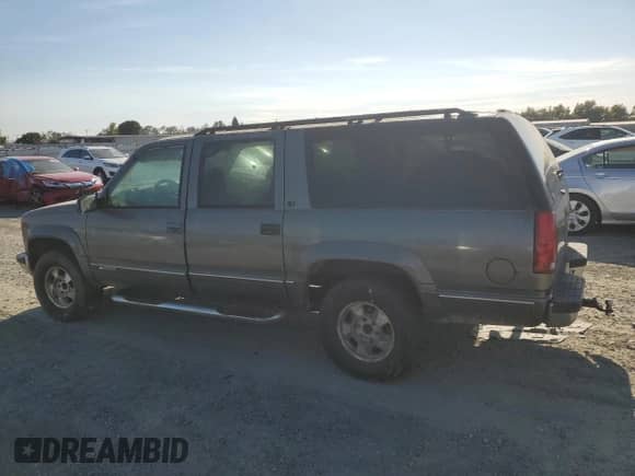 1999 Chevrolet Suburban с VIN 3GNFK16R6XG236729, выставлен на аукционе Copart как лот 71226015 с пробегом Не указан миль и Чистый • Clean title. История ставок и продаж доступна на DreamBid. Изображение 2.