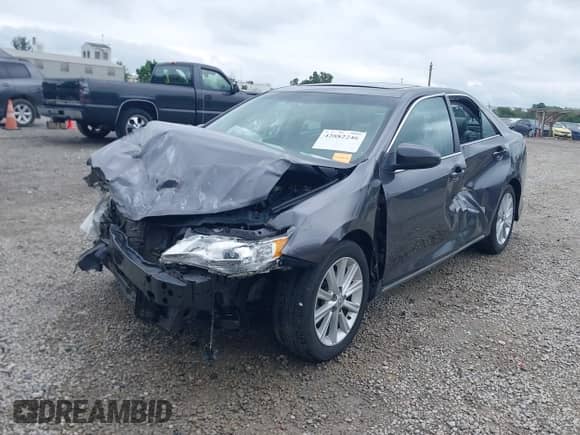 2014 Toyota Camry L with VIN 4T1BF1FK4EU862865, listed as a IAAI auction lot 42882246 with 33,475 mi miles and . Bid and sale history available at DreamBid. Image 2.