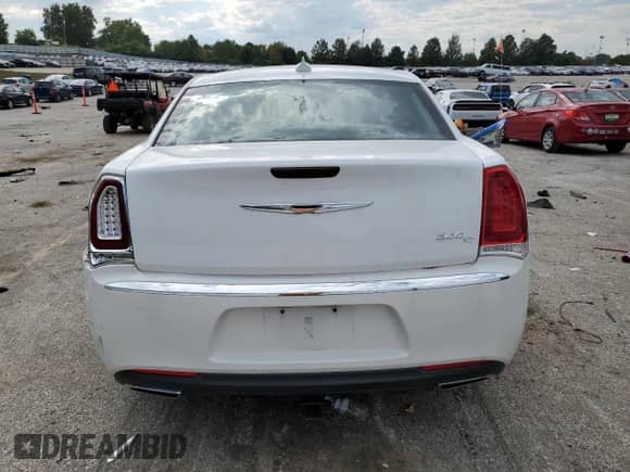 2015 Chrysler 300 C with VIN 2C3CCAEG0FH803108, listed as a Copart auction lot 85306955 with 114,322 mi miles and Salvage title. Bid and sale history available at DreamBid. Image 6.