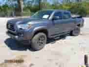 2021 Toyota Tacoma SR5 z VIN 5TFDZ5BN6MX059581, wystawiony jako IAAI lot #42051740 z przebiegiem 65 399 mil mil oraz . Historia ofert i sprzedaży dostępna na DreamBid. Obrazek 18.
