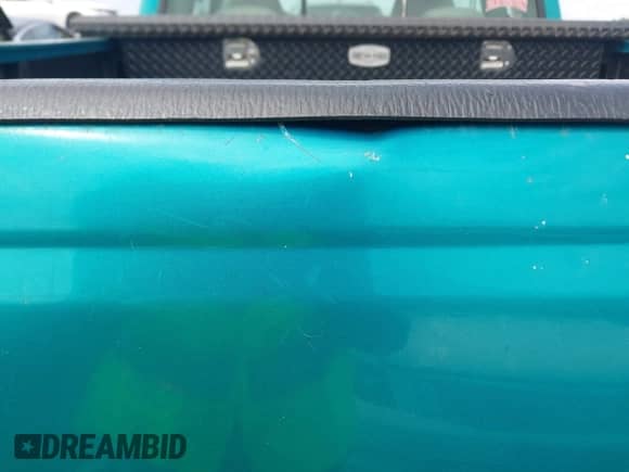 1996 Chevrolet Silverado 1500 with VIN 2GCEK19R5T1152890, listed as a IAAI auction lot 43246016 with 91,660 mi miles and . Bid and sale history available at DreamBid. Image 16.