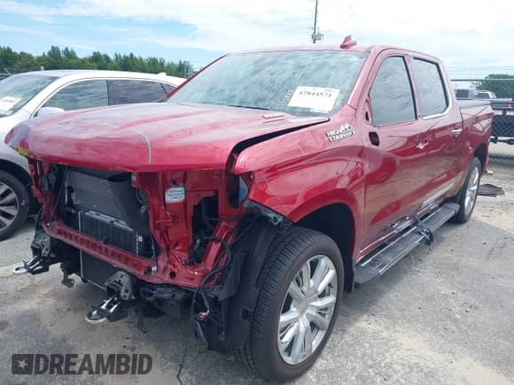 2024 Chevrolet Silverado 1500 High Country z VIN 1GCUDJE83RZ272965, wystawiony jako IAAI lot #42844571 z przebiegiem 18 062 mil mil oraz . Historia ofert i sprzedaży dostępna na DreamBid. Obrazek 18.