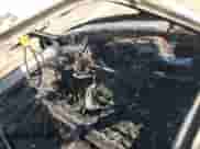 1997 Chevrolet Silverado 1500 z VIN 1GCEK14M4VZ166799, wystawiony jako Copart lot #69846415 z przebiegiem 195 832 mil mil oraz Szkoda całkowita • Salvage title. Historia ofert i sprzedaży dostępna na DreamBid. Obrazek 8.