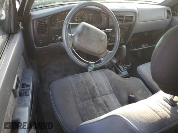 2000 Toyota Tacoma with VIN 5TEWN72N3YZ700698, listed as a Copart auction lot 90316805 with 176,401 mi miles and Salvage title. Bid and sale history available at DreamBid. Image 8.