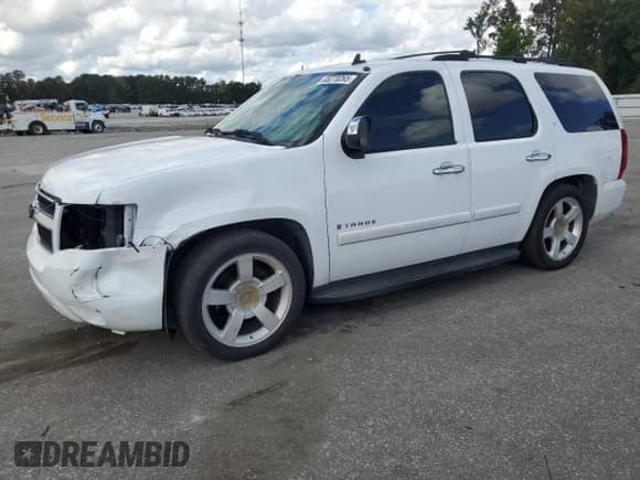 2007 Chevrolet Tahoe LT с VIN 1GNFC13J27R108838, выставлен на аукционе Copart как лот 85270265 с пробегом 265 547 миль миль и Списание • Salvage title. История ставок и продаж доступна на DreamBid. Изображение 1.