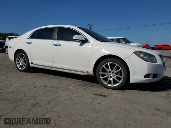 2009 Chevrolet Malibu LTZ with VIN 1G1ZK57B39F124465, listed as a Copart auction lot 84554735 with 205,709 mi miles and Salvage title. Bid and sale history available at DreamBid. Image 4.