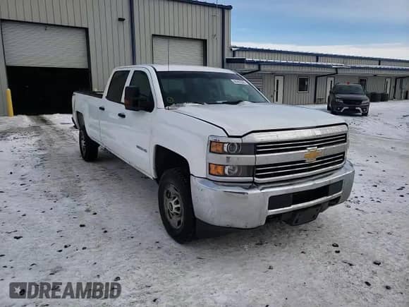 2015 Chevrolet Silverado 2500HD Work Truck z VIN 1GC1KUEG7FF649263, wystawiony jako Copart lot #44401835 z przebiegiem 184 654 mil mil oraz Szkoda całkowita • Salvage title. Historia ofert i sprzedaży dostępna na DreamBid. Obrazek 11.