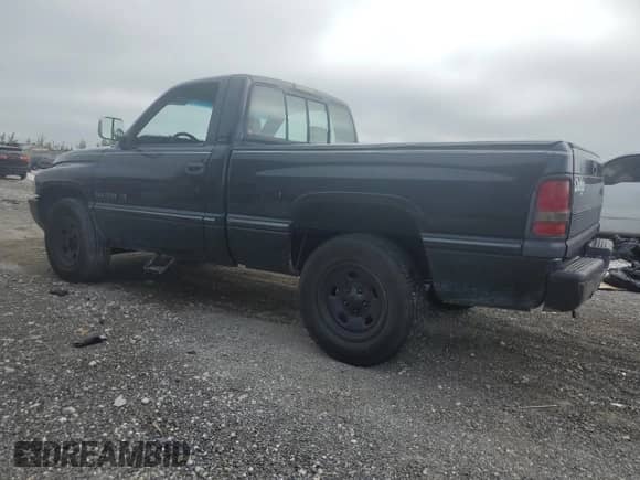 1997 Dodge 1500 с VIN 1B7HC16YXVJ609904, выставлен на аукционе Copart как лот 70595635 с пробегом 95 694 миль миль и Списание • Salvage title. История ставок и продаж доступна на DreamBid. Изображение 2.