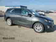 2018 Chevrolet Equinox LT with VIN 2GNAXSEV2J6315382, listed as a Copart auction lot 80486575 with 124,265 mi miles and Salvage title. Bid and sale history available at DreamBid. Image 4.