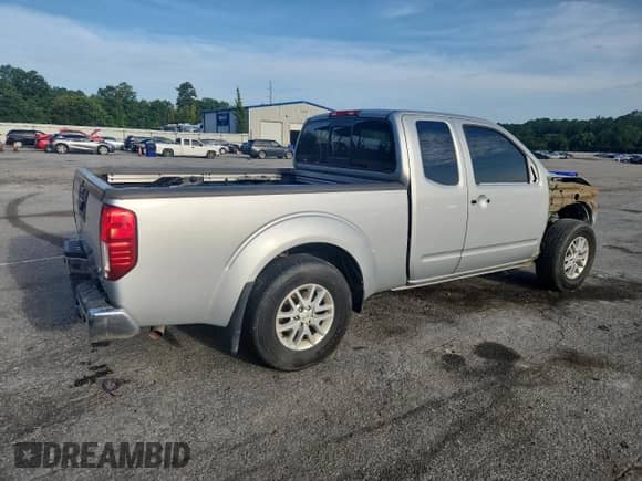 2017 Nissan Frontier SV with VIN 1N6DD0CU8HN732702, listed as a Copart auction lot 60321505 with 111,699 mi miles and Salvage title. Bid and sale history available at DreamBid. Image 3.