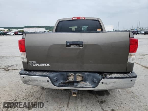 2012 Toyota Tundra Limited z VIN 5TFFY5F17CX126867, wystawiony jako Copart lot #84811695 z przebiegiem 150 642 mil mil oraz Szkoda całkowita • Salvage title. Historia ofert i sprzedaży dostępna na DreamBid. Obrazek 6.
