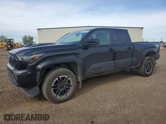 2024 Toyota Tacoma SR5 with VIN 3TYLB5JN2RT055045, listed as a Copart auction lot 69134065 with 25,584 mi miles and Salvage title. Bid and sale history available at DreamBid. Image 1.