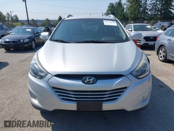 2014 Hyundai Tucson SE with VIN KM8JU3AG7EU827995, listed as a IAAI auction lot 43132438 with 133,127 mi miles and . Bid and sale history available at DreamBid. Image 12.