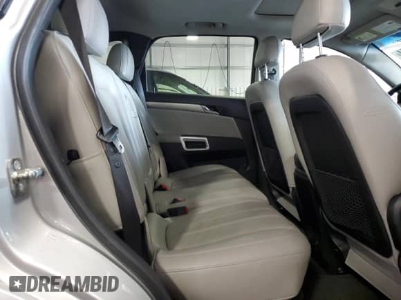 2012 Chevrolet Captiva Sport LTZ z VIN 3GNFL4E51CS652305, wystawiony jako Copart lot #71228894 z przebiegiem 100 002 mil mil oraz Szkoda całkowita • Salvage title. Historia ofert i sprzedaży dostępna na DreamBid. Obrazek 11.