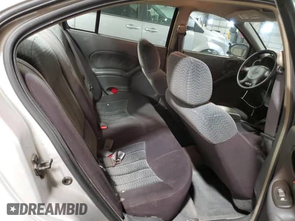 2003 Pontiac Grand Am SE1 with VIN 1G2NF52E13M550724, listed as a Copart auction lot 56990665 with 214,603 mi miles and Salvage title. Bid and sale history available at DreamBid. Image 10.