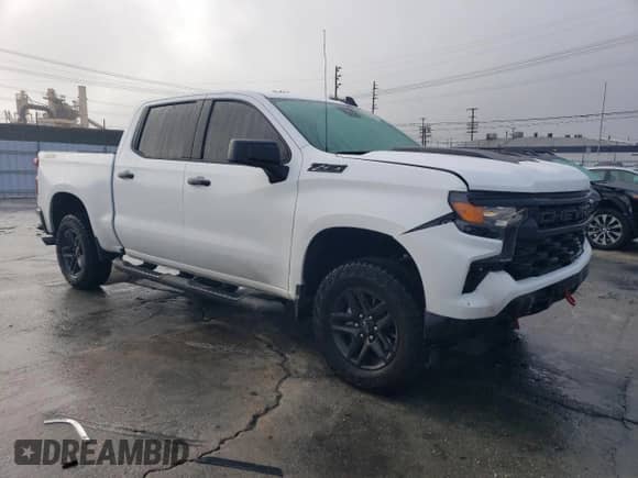 2024 Chevrolet Silverado 1500 Custom Trail Boss with VIN 3GCPDCEK1RG233344, listed as a Copart auction lot 44250765 with 5,906 mi miles and Salvage title. Bid and sale history available at DreamBid. Image 4.