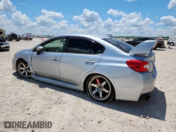 2017 Subaru WRX STI with VIN JF1VA2V61H9812948, listed as a Copart auction lot 61831605 with 118,476 mi miles and Salvage title. Bid and sale history available at DreamBid. Image 2.