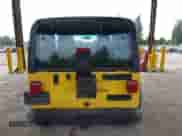 2004 Jeep Wrangler Sport z VIN 1J4FA49S04P788403, wystawiony jako IAAI lot #43184950 z przebiegiem 290 533 mil mil oraz . Historia ofert i sprzedaży dostępna na DreamBid. Obrazek 16.