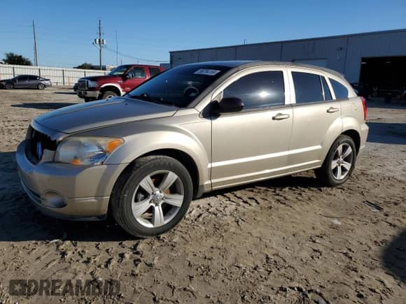 2010 Dodge Caliber Uptown z VIN 1B3CB9HB8AD611181, wystawiony jako Copart lot #86784104 z przebiegiem 119 103 mil mil oraz Szkoda całkowita • Salvage title. Historia ofert i sprzedaży dostępna na DreamBid. Obrazek 1.