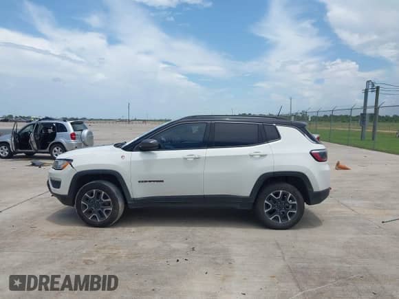 2021 Jeep Compass Trailhawk z VIN 3C4NJDDB3MT520448, wystawiony jako IAAI lot #42675404 z przebiegiem 84 376 mil mil oraz . Historia ofert i sprzedaży dostępna na DreamBid. Obrazek 14.